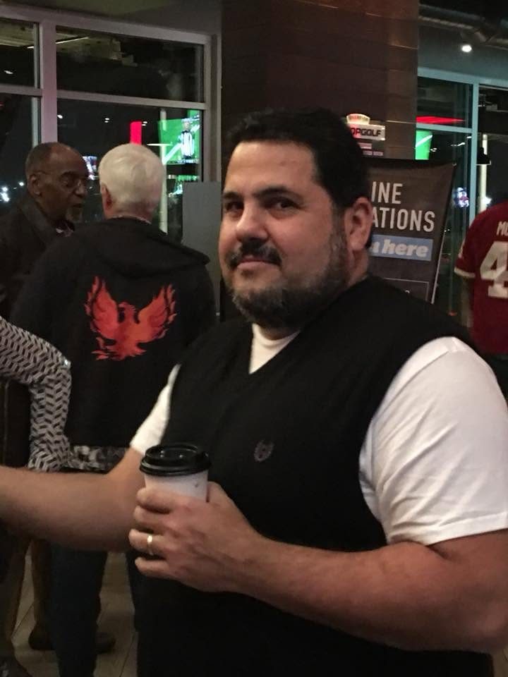 Juan at an evening event